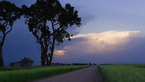 Peaceful Sunset Storm with Lightning Strikes Stock Footage 295399916