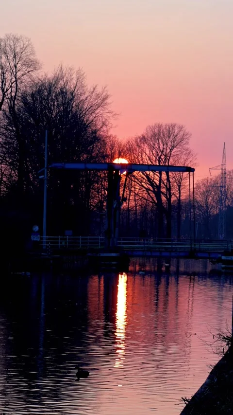 Peaceful Sunset Timelapse over a Canal Drawbridge in Belgium Video stock 332837427