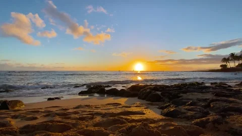 Peaceful sunset with waves calmly crashing Stock Footage