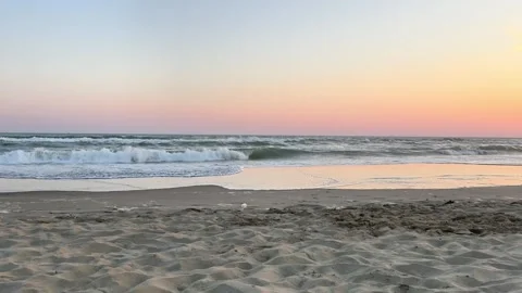 Peaceful Sunset Waves Rolling onto Sandy Beach at Calm Evening Stock Footage 341656351