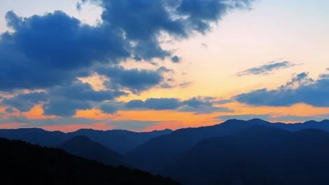 Peaceful Twilight Glow Over Remote Chinese Mountains Vídeo Stock 334840438