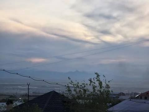 Peaceful Twilight Sky With Soft Clouds Stock Photos