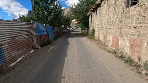 A peaceful walk along an empty street in the remote village of Zangla, Ladakh, I Stock Footage 320335136