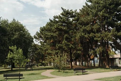 Peaceful walking paths wind through the green landscape of Tasmajdan Park in  Stock Photos