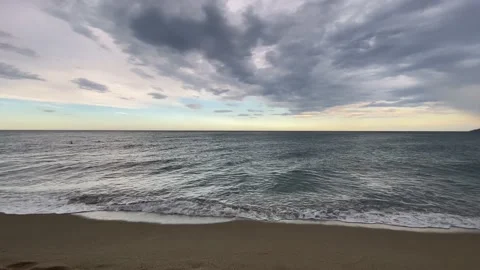 Peaceful Waves Rolling On The Beach, Cloudy Sky, 4K Stock Footage 142567888