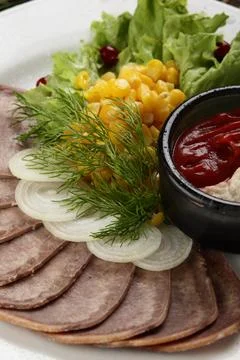 Peaces of meat with vegetables Stock Photos