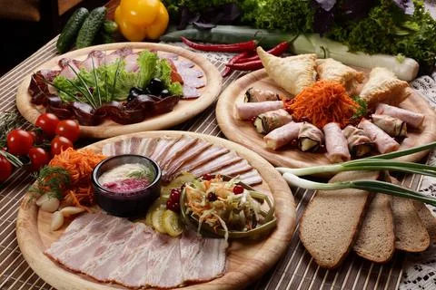 Peaces of meat with vegetables Stock Photos