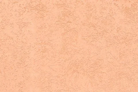 Peach background with rough texture for your design. Showcasing the color of Foto stock