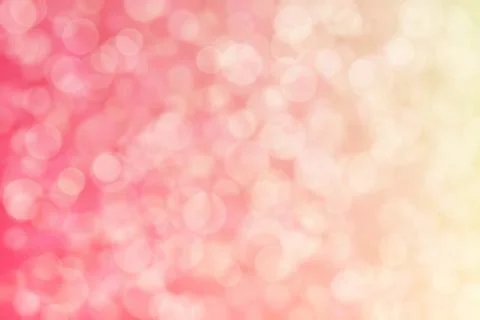 Peach colored background with circle shaped bokeh. Pink to beige gradient. Stock Photos