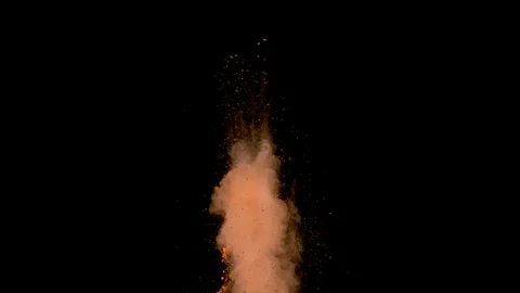 Peach colored powder explosion. Slow motion with acceleration in vertical motion Video stock 122455090