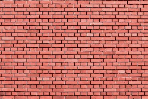 Peach echo colored brick wall background Peach echo colored brick wall bac... Foto stock