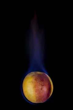 Peach on fire Stock Photos