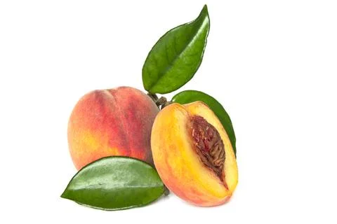 Peach fruit half with leaf isolated on white background Foto stock