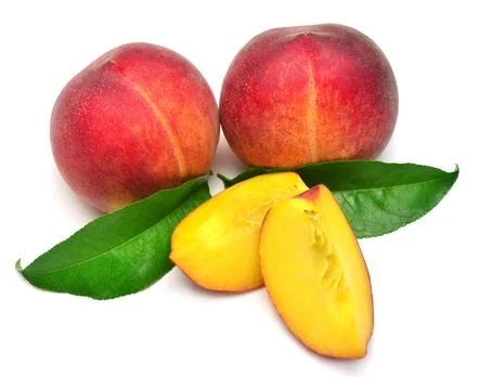 Peach fruit whole and slice with leaf isolated on white background. Perfect.. Stock Photos