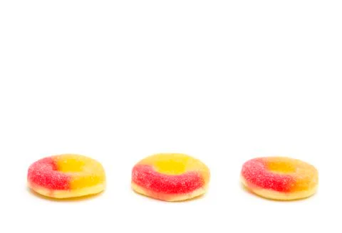 Peach Gummies on a White Background Stock Photos