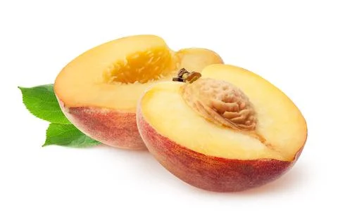 Peach isolated. Two peach half slices fruits and leaves isolated on white with Stock Photos