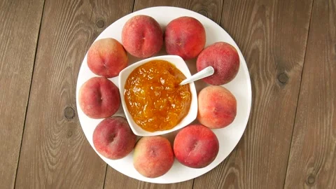 Peach jam on a plate. Stock Footage 301862947