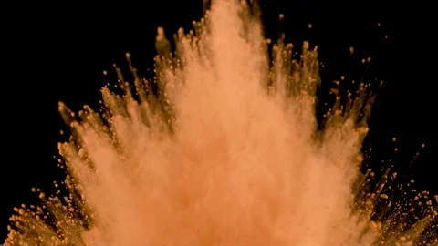 Peach powder explosion on black background. Slow motion with acceleration Stock Footage 122436403