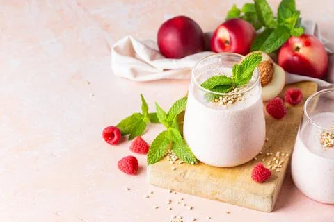 Peach raspberry smoothie, summer refreshing drink, beverage Stock Photos