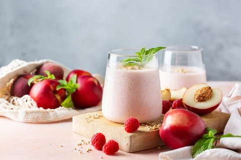 Peach raspberry smoothie, summer refreshing drink, beverage 스톡 사진