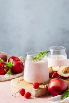 Peach raspberry smoothie, summer refreshing drink, beverage 스톡 사진