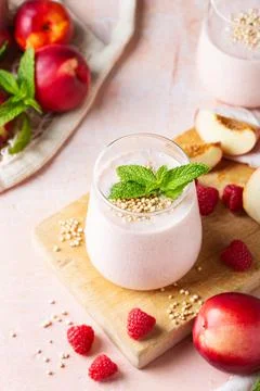 Peach raspberry smoothie, summer refreshing drink, beverage Stock Photos