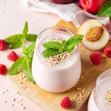 Peach raspberry smoothie, summer refreshing drink, beverage Stock Photos