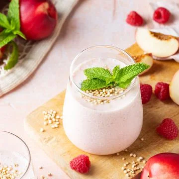 Peach raspberry smoothie, summer refreshing drink, beverage Stock Photos