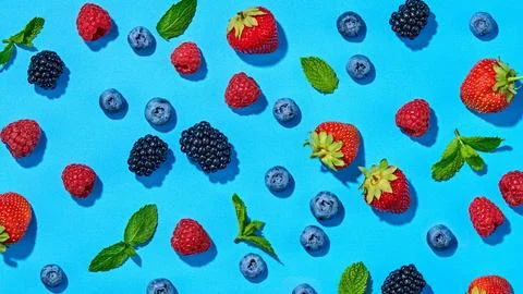 Peach, raspberry, strawberry colorful pattern on pink background. Fresh pea.. Stock Photos