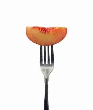 Peach Slice on a Fork; White Background Stock Photos