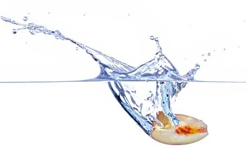 Peach Slice Ripples Stock Photos