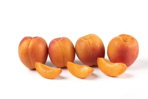 Peach slices isolated on white background in geometric position Stock Photos