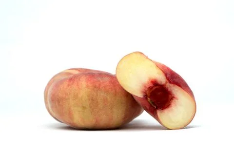 Peach slices on the table Stock Photos