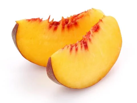 Peach slices on white background Stock Photos