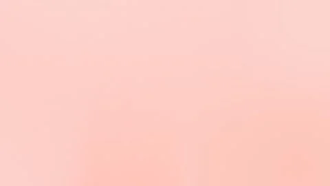 Peach soft gradient seamless loop background, 4K. Subtle pastel hues blend Stock Footage 297914940