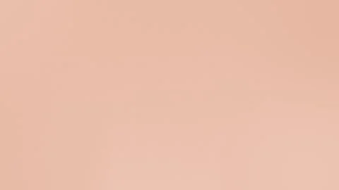 Peach solid seamless loop background, soft and subtle texture, warm hue. 4K Stock Footage 299397102