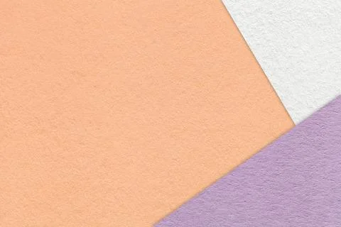 Peach textured paper background with white lilac triangular corners and cop.. Illustrazione stock