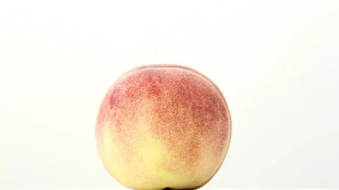The peach on the white background Stock-Footage 91799325