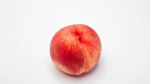 Peach on a white background. Ripe peach fruit rotating on white background Stock Footage 72583306