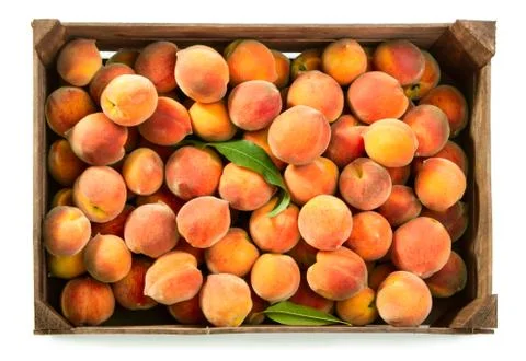 Peaches in box Stock Photos