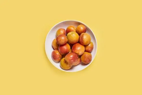Peaches on a plate Stock Photos