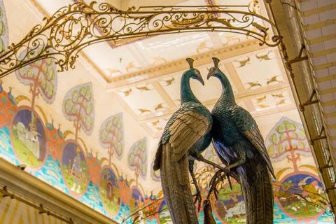 Peacocks creating a heart shape inside of Leadenhall Market in London, England Stock Photos