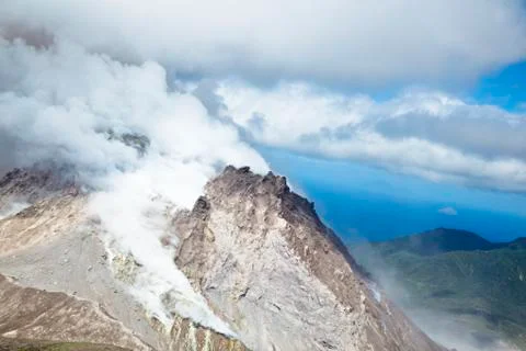The peak of the active Soufriere Hills Volcano in Montserrat seen from helico Stock Photos