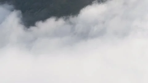 Peak of Beriáin, in the Andía mountain range, rising among the white clouds. Stock Footage 263377113