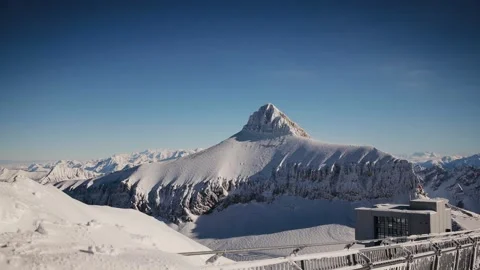 Peak of Mount Oldenhorn on a clear winter day. Winter scene on the Glacier des Stock Footage 224537349