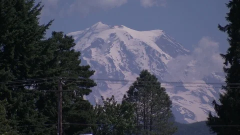 Peak of Mount Rainier Haloed by Pine Trees Stock Footage 86755401