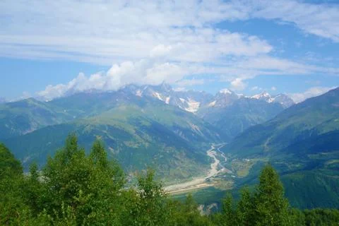 Peak of mount Ushba covered in clouds in Caucasus mountains, Upper Svaneti re Stock Photos