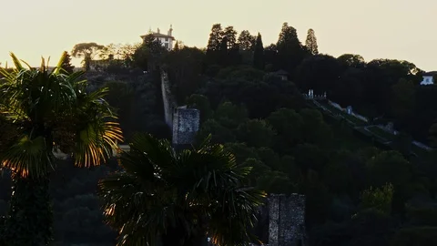 A peak of a mountain illuminated by the sunset Stock Footage 122131604