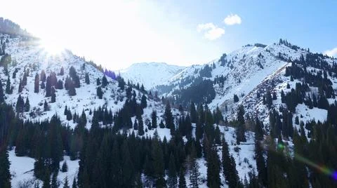 Peak Of Mountains with Sun Rays Stock Photos