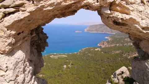 Peak through Monolithos Castle Window Stock Footage 158121085